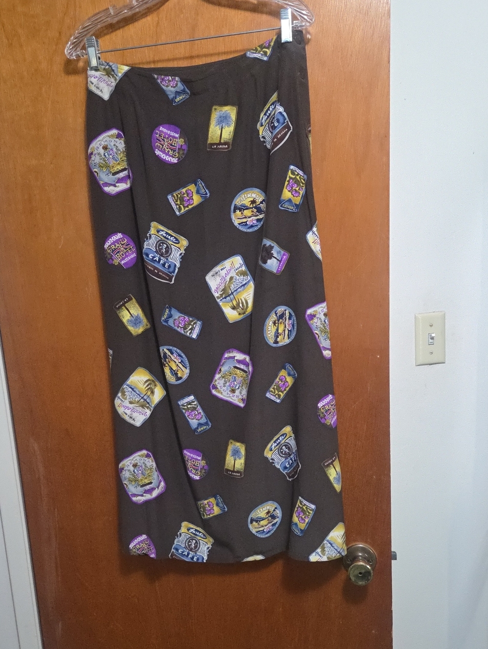 Brown Maxi Skirt with Playful Travel Sticker Print